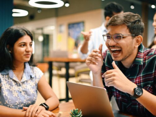 Group of young people discussing new venture  set up in the co-working office